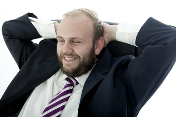 business man with beard is happy and relaxing
