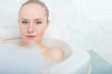 Bath woman enjoying bahub. Naturaly beautiful female relaxing