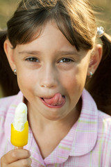 Pretty girl eating ice cream