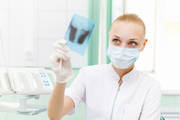 Female doctor with X-ray