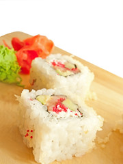 closeup of a sushi roll on the desk