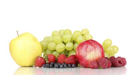 Mix of ripe sweet fruits and berries isolated on white