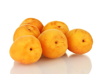 Ripe apricots isolated on white close-up