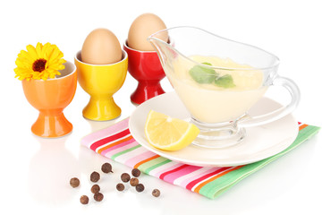 Mayonnaise in bowl on napkin isolated on white