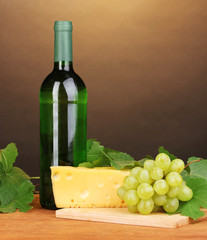 Bottle of great wine with glass and cheese