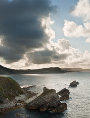Sunrise ocean landscape Mupe Bay Jurassic Coast England