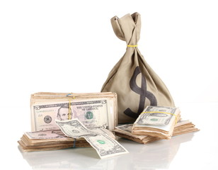 Bag with stacks of dollars isolated on white