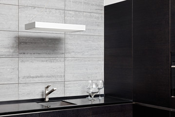 Part of modern kitchen interior with sink