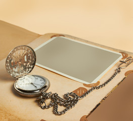 retro album page with vintage clock with chain