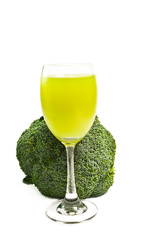 Pure fresh green broccoli juice in glass isolated on white backg