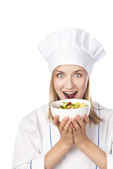Positive young chef in the studio