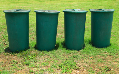 Large green plastic bins