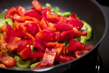 healthy diet: cooking sliced peppers