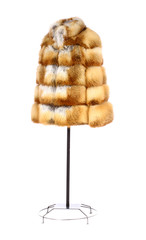 Women fur coat on white background 