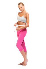 happy woman measuring perfect shape of beautiful waist