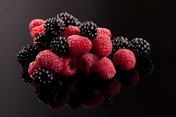 Delicious berries on black.