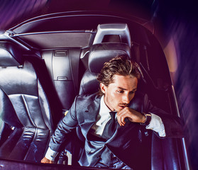 Beauty stylish guy in  car .