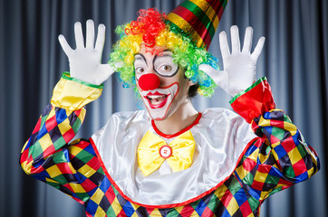 Funny clown in studio shooting