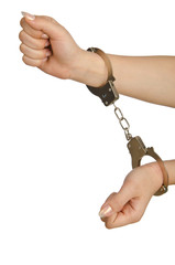 Handcuffed hands on white background
