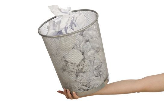 Hands with garbage bin with paper