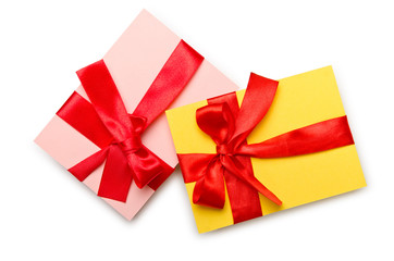 Envelope with colourful ribbon on white