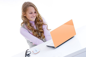 Schoolgirl with her white netbook