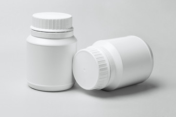 Two White Plastic Containers