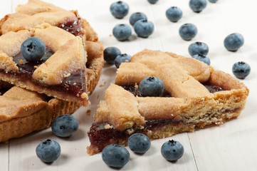 blueberry tart on wooden table