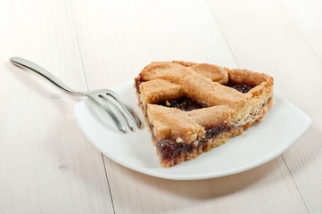 slice fruit tart on plate