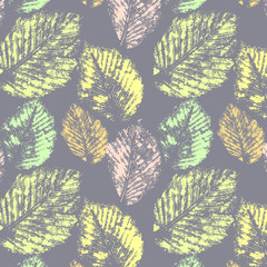 Pastel autumn leaves prints on gray seamless pattern, vector