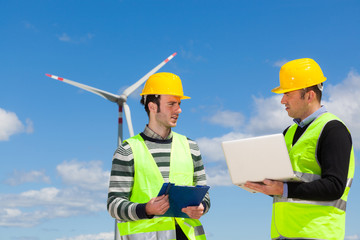 Two Engineers in a Wind Turbine Power Station