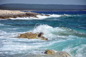 Waves crushing on a rocky beach