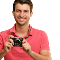 Fototapeta premium Portrait of a man holding camera