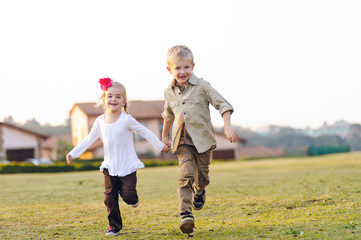 playful childhood siblings