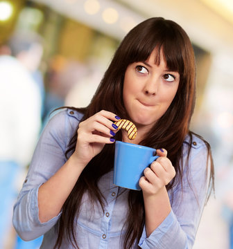 Beautiful Woman With Coffee And Cookies