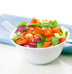 fresh vegetable salad with basil