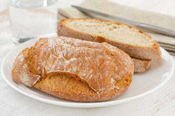 bread on the white plate