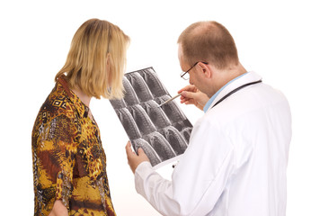 Medical doctor examining a patient