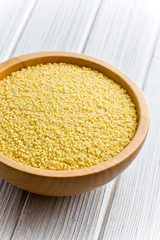 couscous in wooden bowl