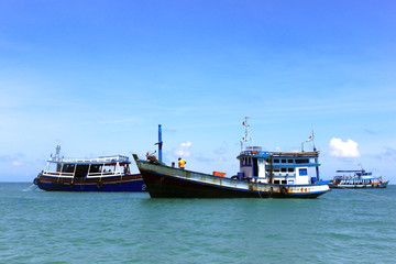 Naklejka premium Fishing boat group in the sea