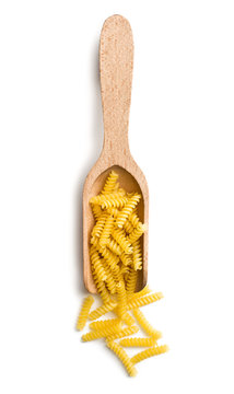 torti pasta in wooden scoop