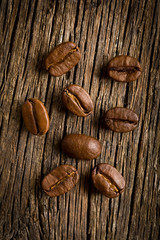 coffee beans on wooden background