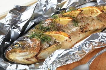 Fototapeten Baked trout with lemon and dill © Viktor