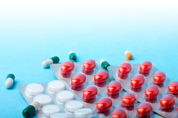 Packs of different pills - abstract medical background