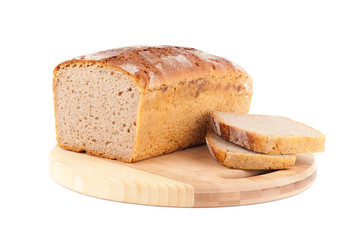 rye bread  on wooden plate isolated on white