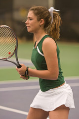 Female Tennis Player Ready At Net
