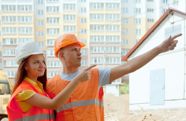 Portrait of builders at building site