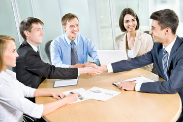 Business people shaking hands