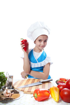Happy little chef cook with Bell Pepper.