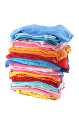 Pile of multiple color cloths on white background.